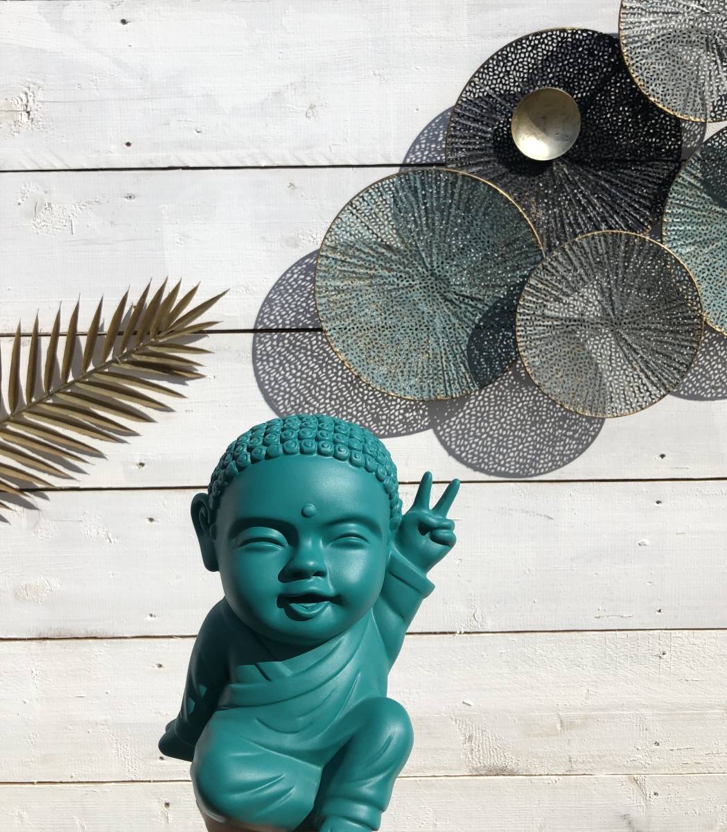 Statue décorative bébé bouddha joyeux en décoration intérieur