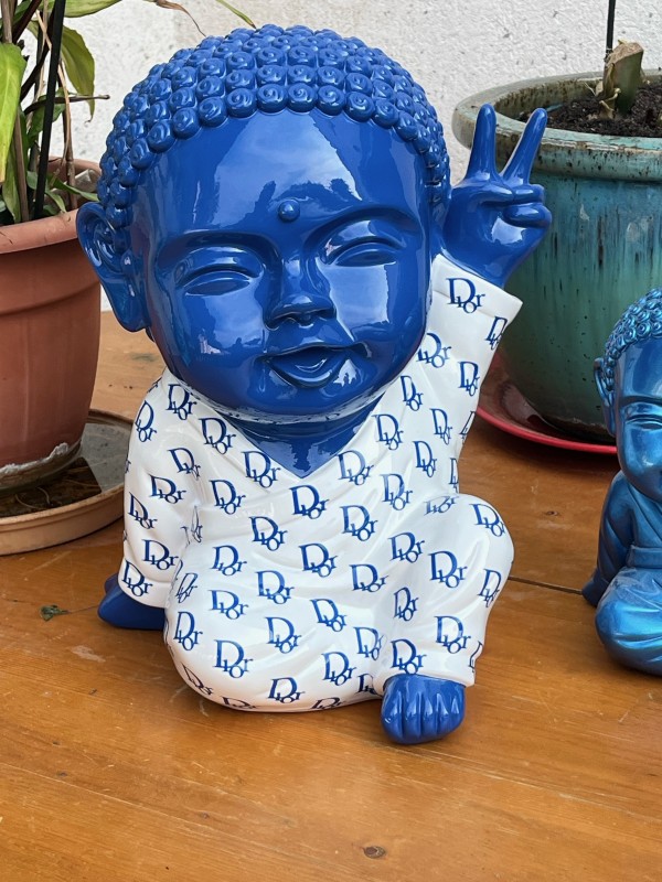 Création de statue Bouddha avec logo entreprise intégré pour événement corporate dans palace à Monaco